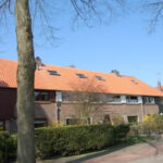 Dakrenovatie van vier woningen in Hilversum
